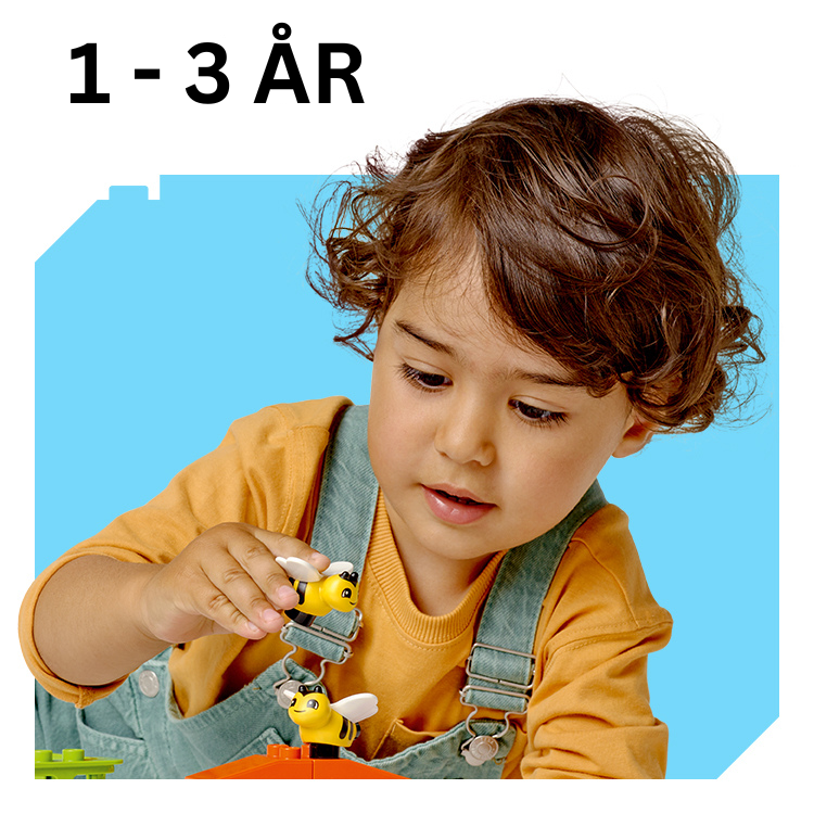 Lille barn leker med bier og byggeblokker, 1-3 år, perfekt barnelek for små barn