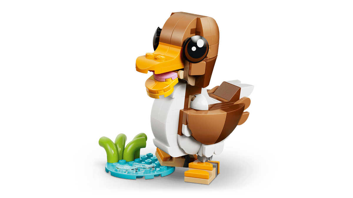 LEGO andedukke med gule føtter og grønn vannplante, perfekt barnelek
